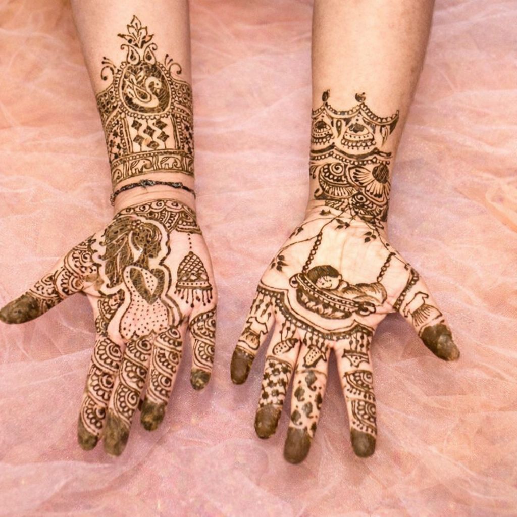 Custom Ganesh and peacock henna